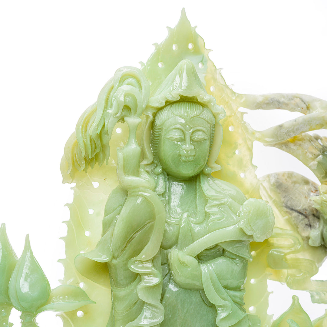 Agate and wood sculpture depicting the gentle Kwan Yin with blossoming lotuses.
