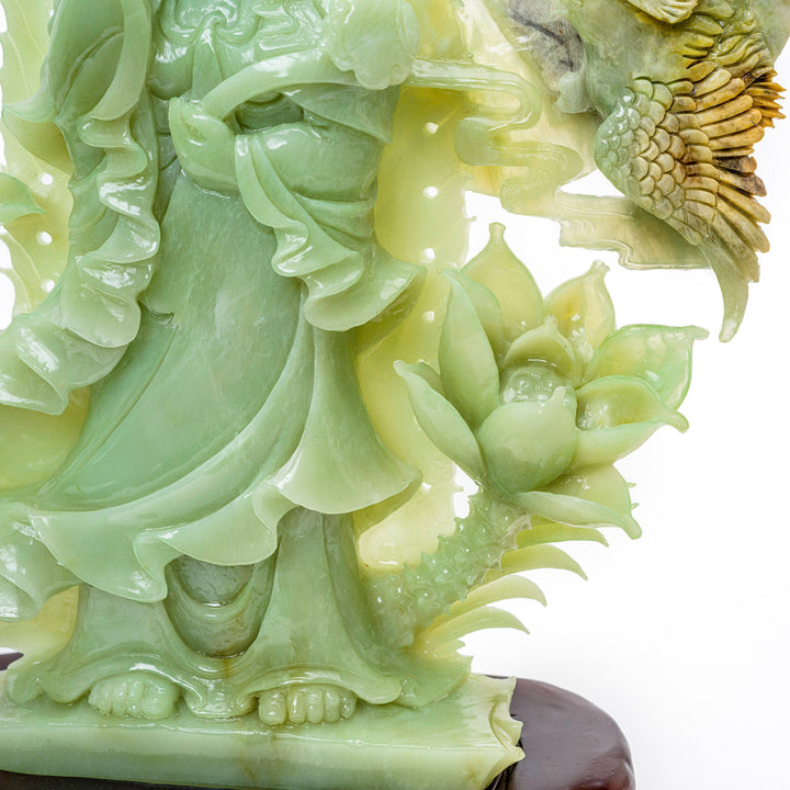 Kwan Yin's grace captured in agate, with willow branch and scepter, for meditative decor.