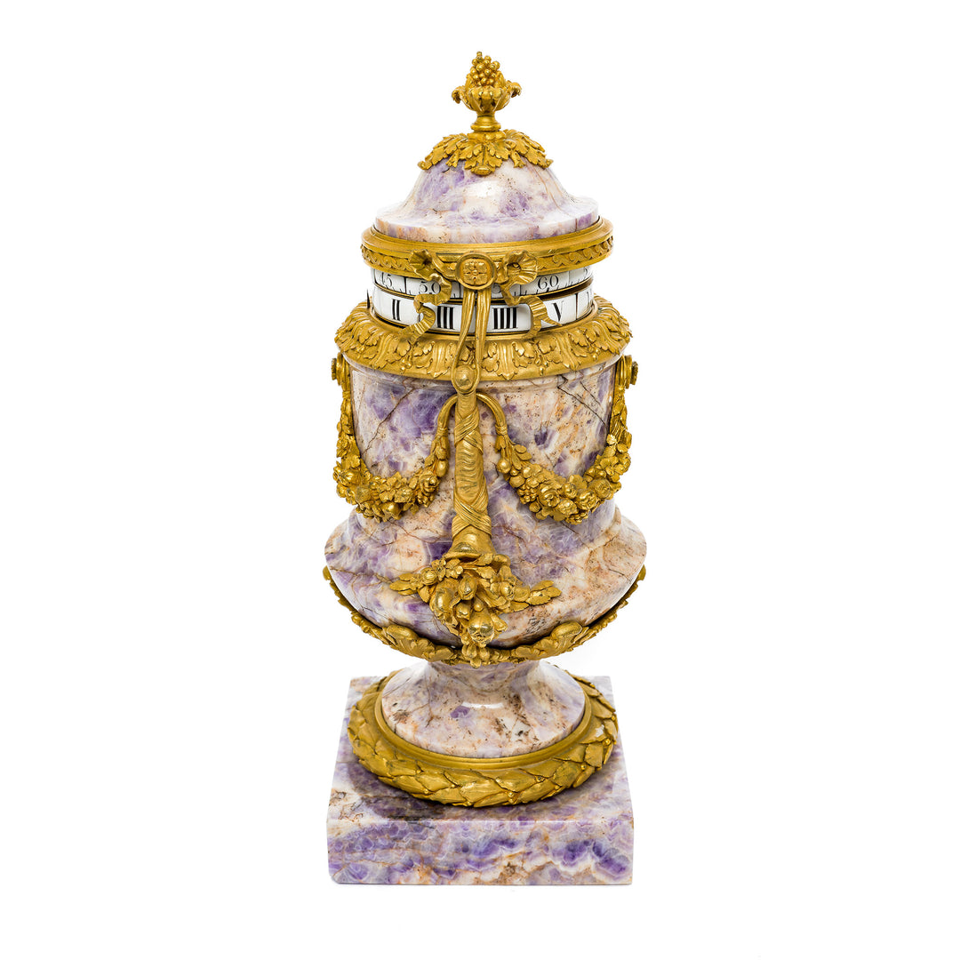 19th-century gilt bronze amethyst clock with intricate detailing.