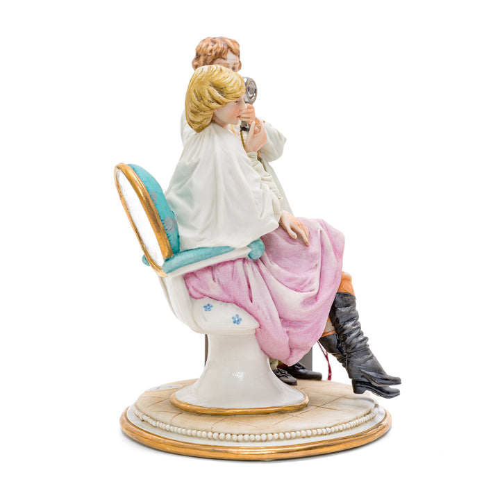 Artistic porcelain depiction of a professional hairstylist.