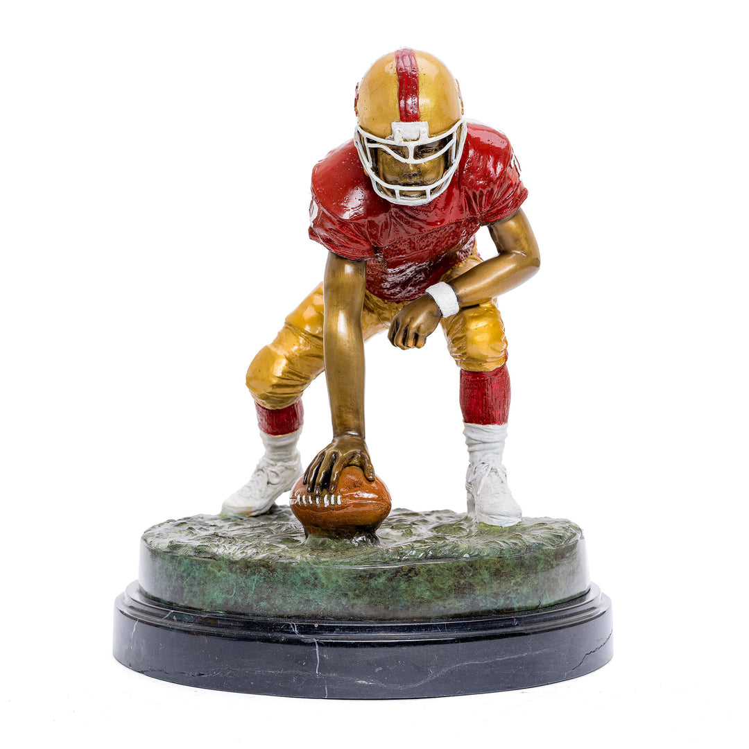 Bronze football player statue with 49er-inspired patina.