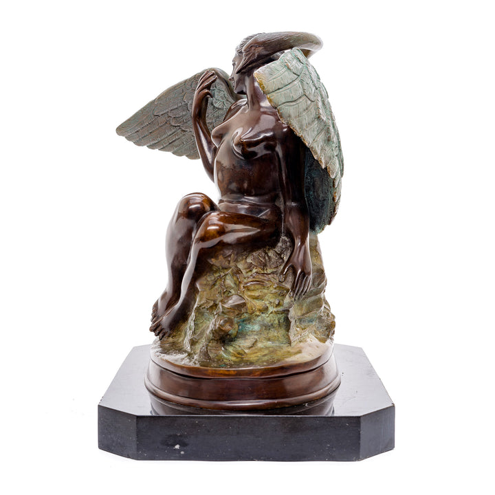 Elegant bronze statue depicting the mythical unity of woman and swan