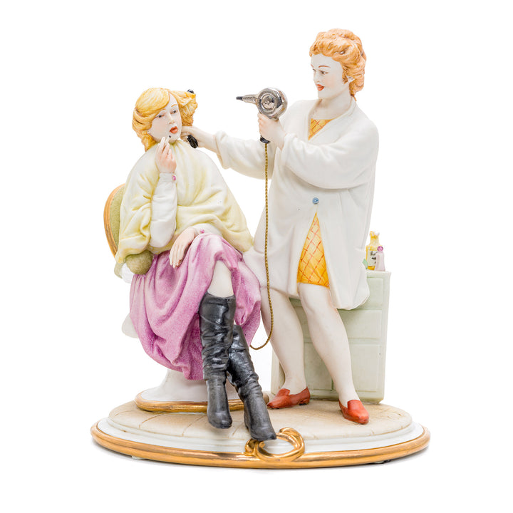 Capodimonte porcelain figurine of a hairdresser.