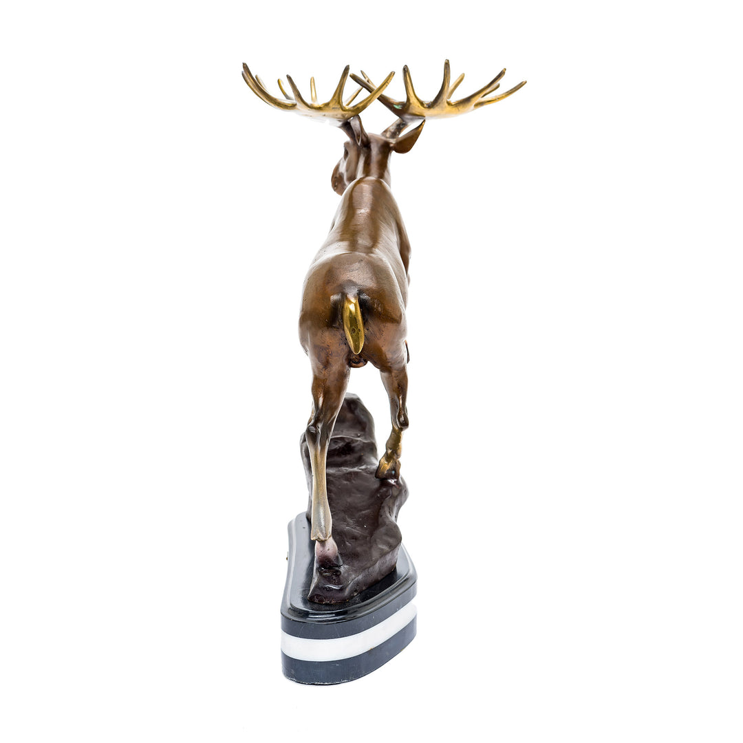 Lifelike bronze figure of a moose with rich patina