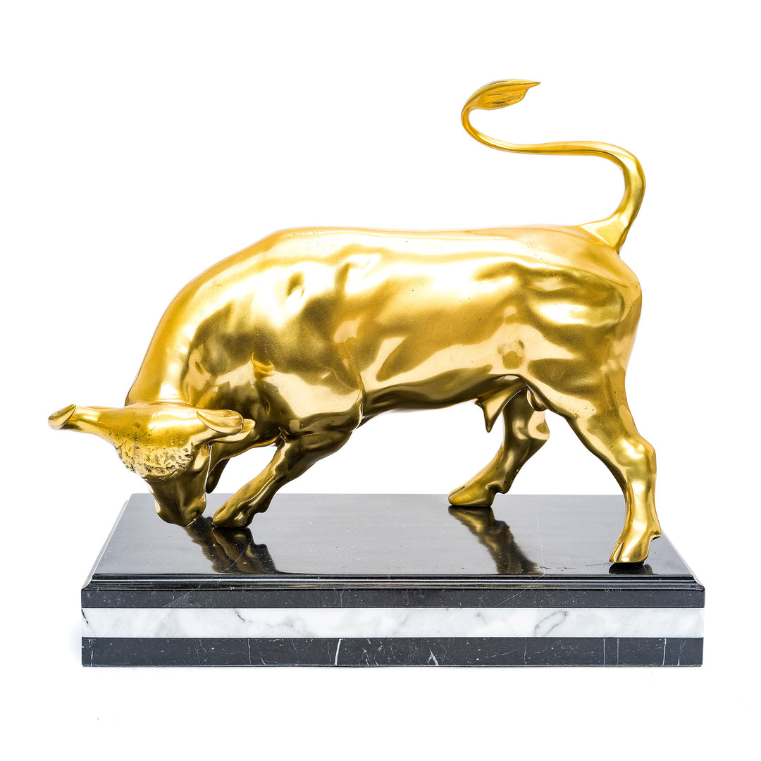Majestic gold bull sculpture in bronze