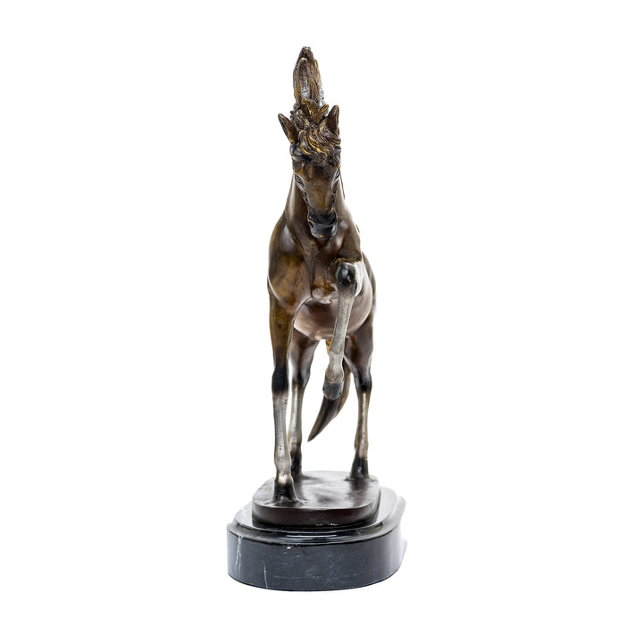 Elegant bronze horse statue on marble base.