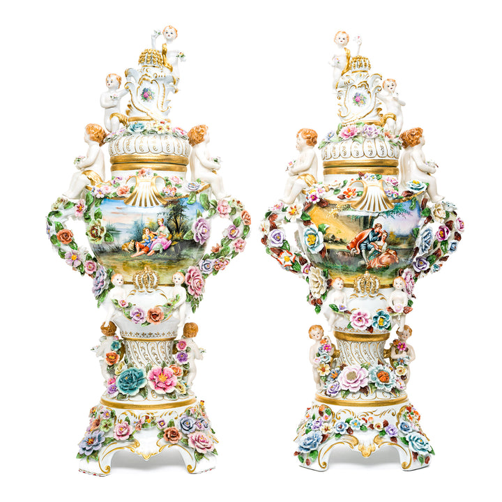 Dresden porcelain King vases with cherub and floral design