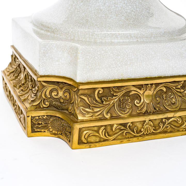 Detailed view of doré bronze accents on porcelain planters