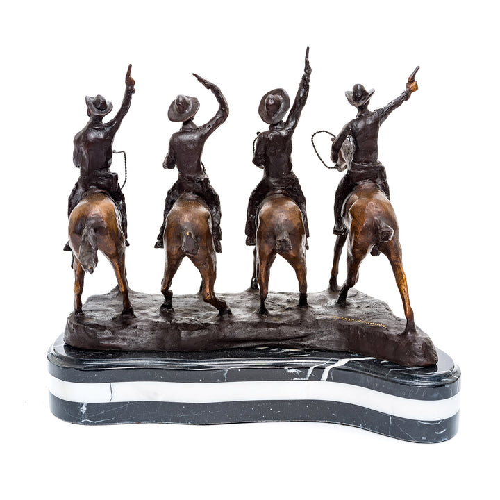 Remington's small bronze artwork of galloping cowboys