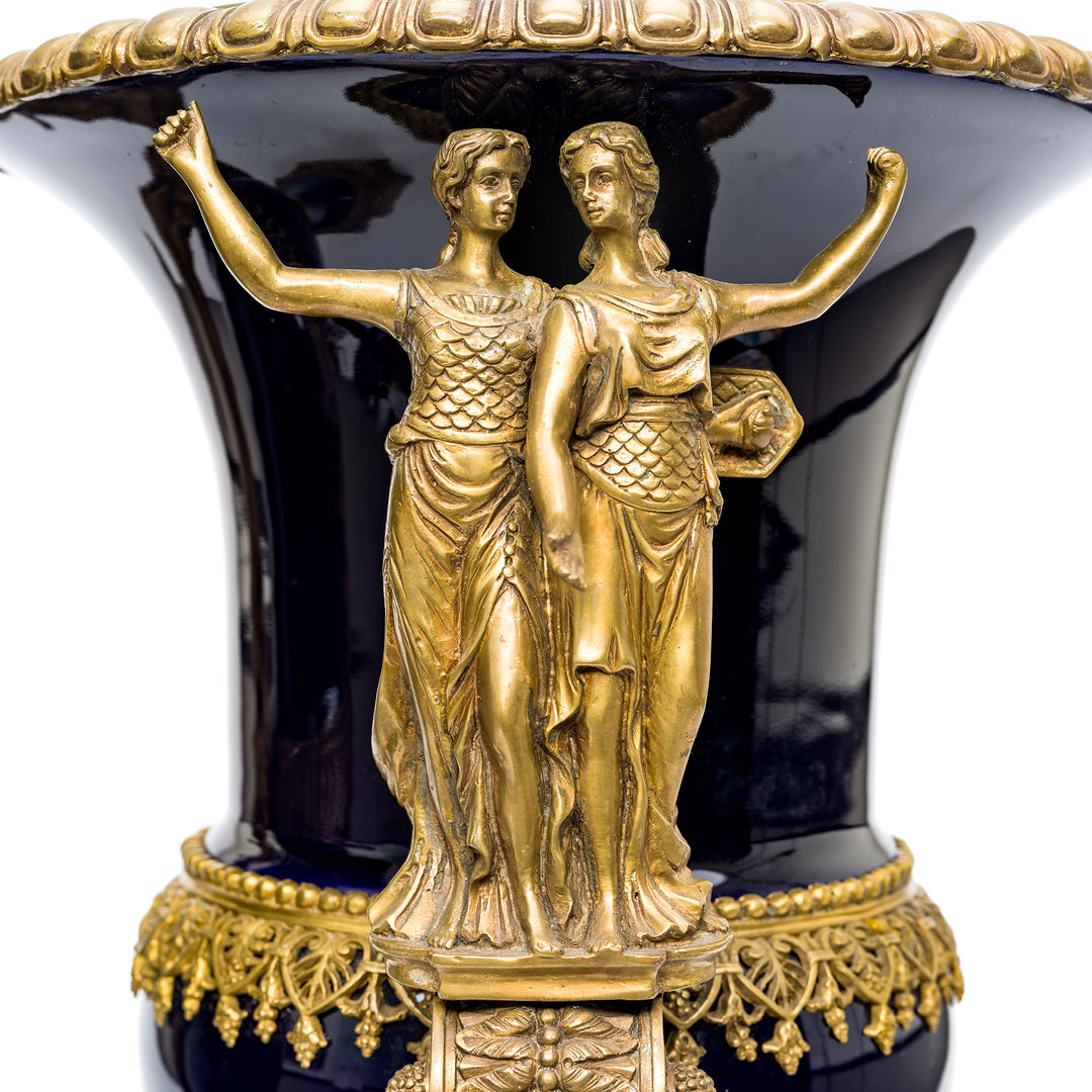 Luxurious cobalt blue vase with mythological bronze figures