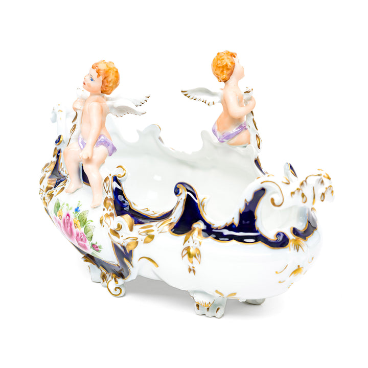 Collectible porcelain serving dish with cherub figures