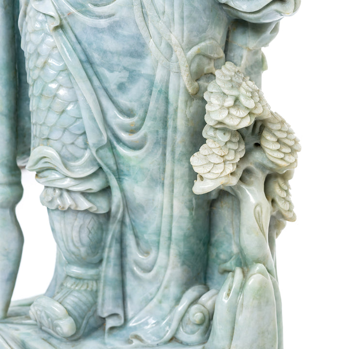 Close-up of intricate carving on jade general statue