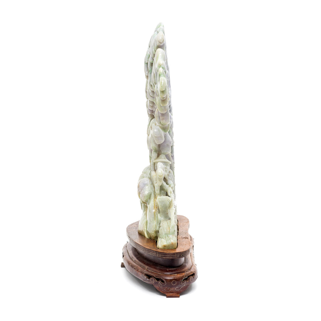 Side view of intricate lavender jade statue