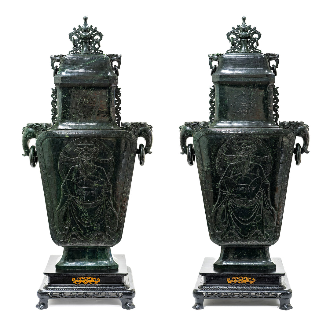 Pair of spinach green jade vases with wood bases