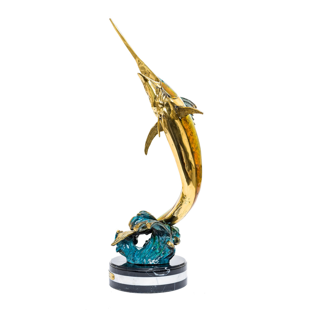 Detailed bronze swordfish art piece on elegant marble base.