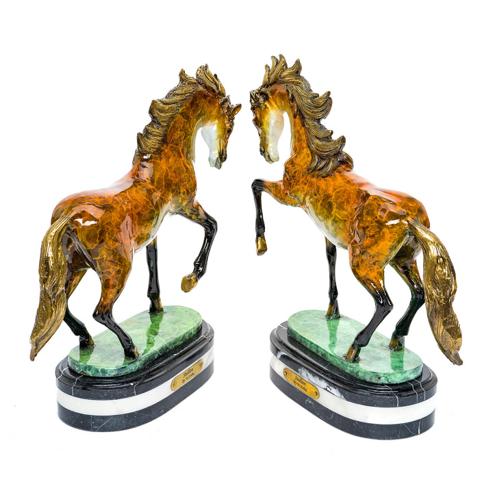 Artistic bronze sculptures of rearing horses