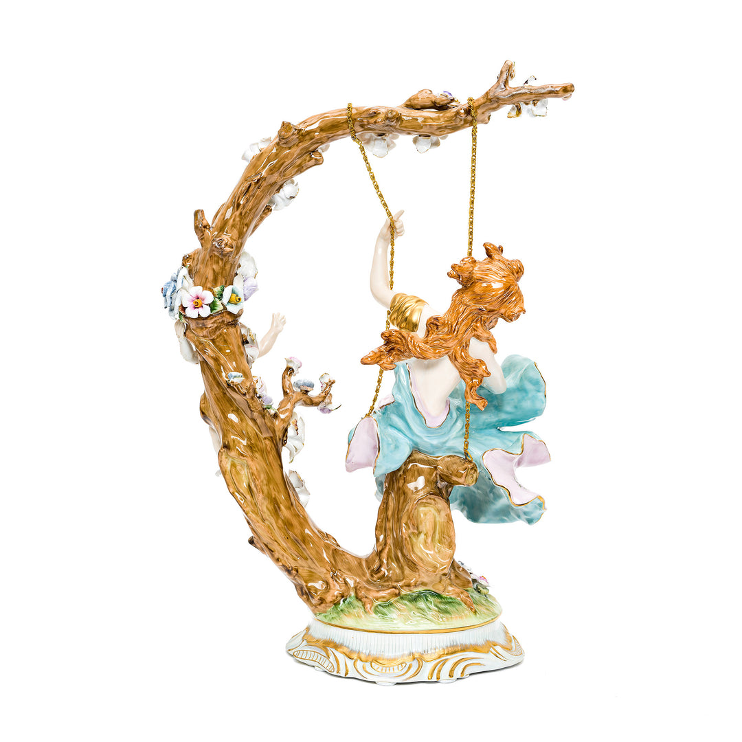 High-quality porcelain lady on swing sculpture