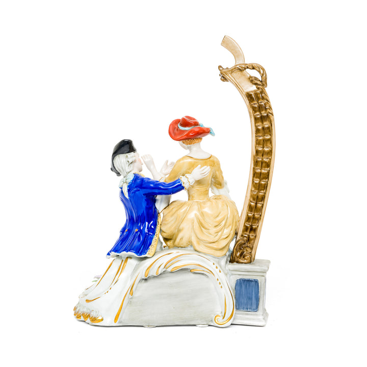 Handcrafted Dresden Porcelain Couple, rich in color and detail.