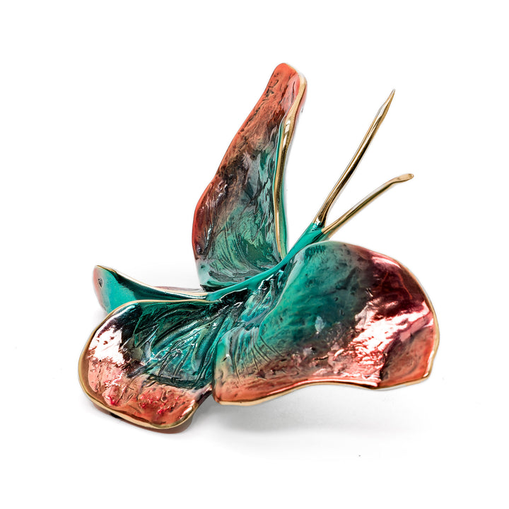 Side view of bronze butterfly with upward wing posture