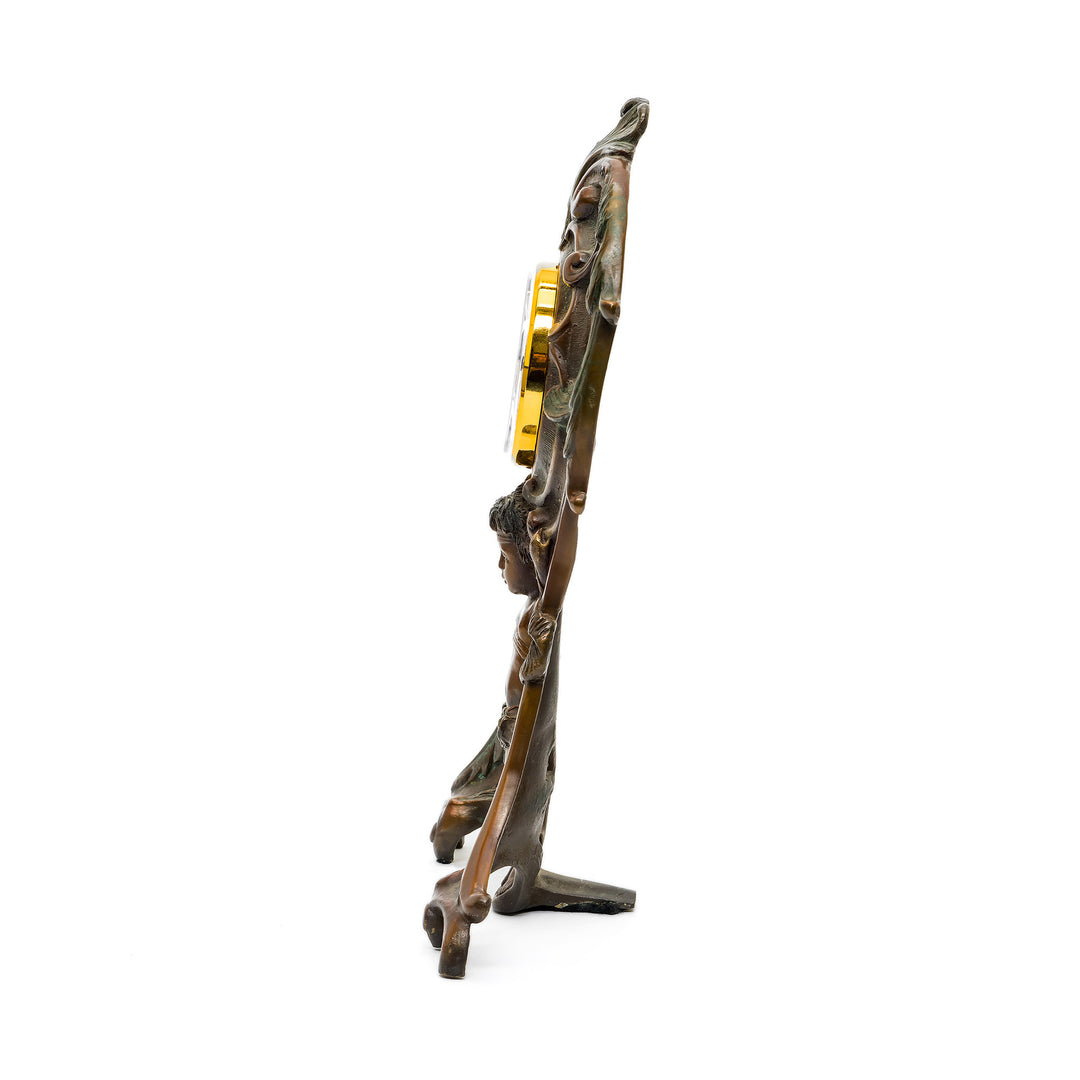 Side profile of sculpted bronze cherub clock