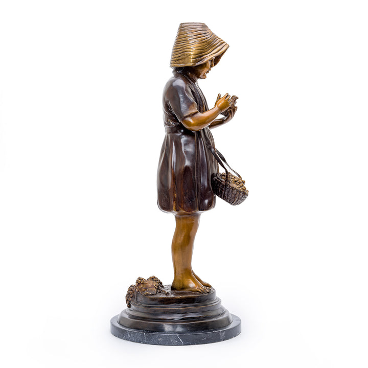 Nature-inspired bronze statue of a girl, for a touch of serenity in decor