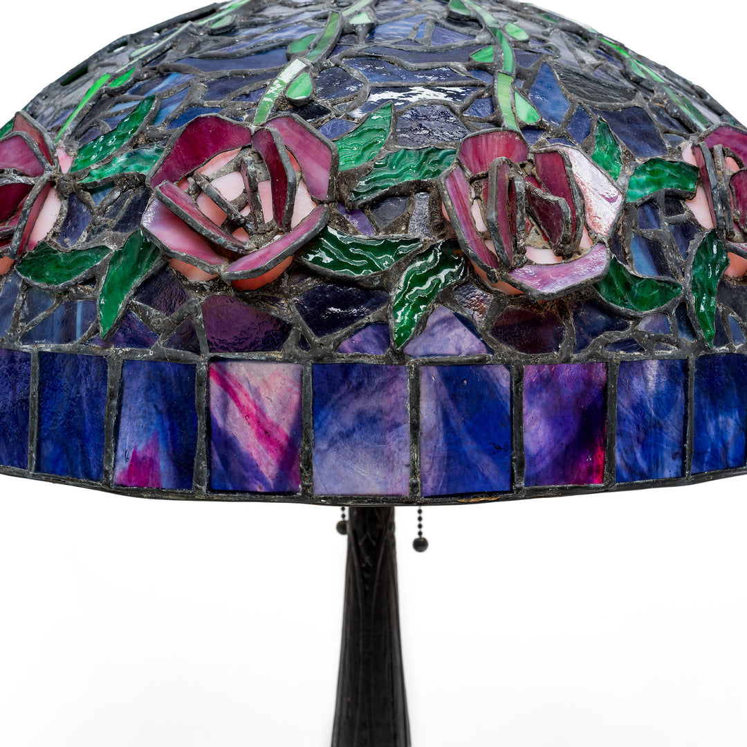 Close-up of three-dimensional glass rose motif