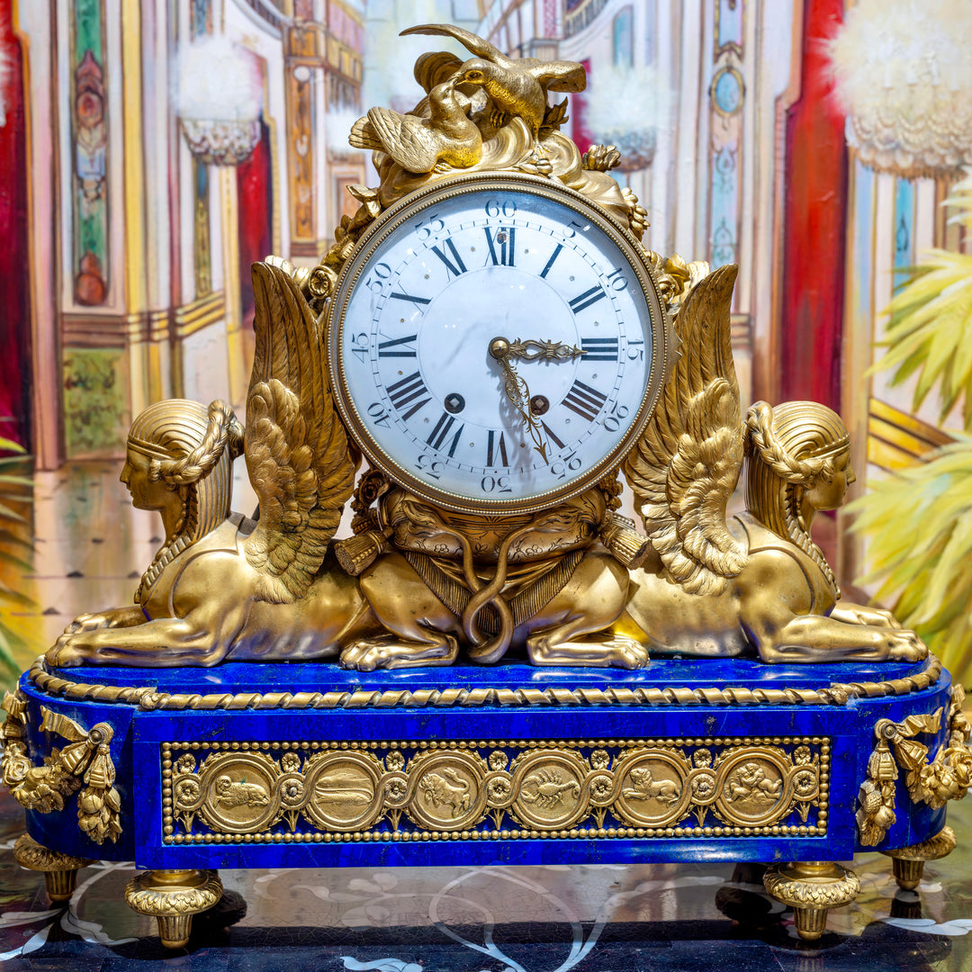 French mantle clock showcasing zodiac elegance