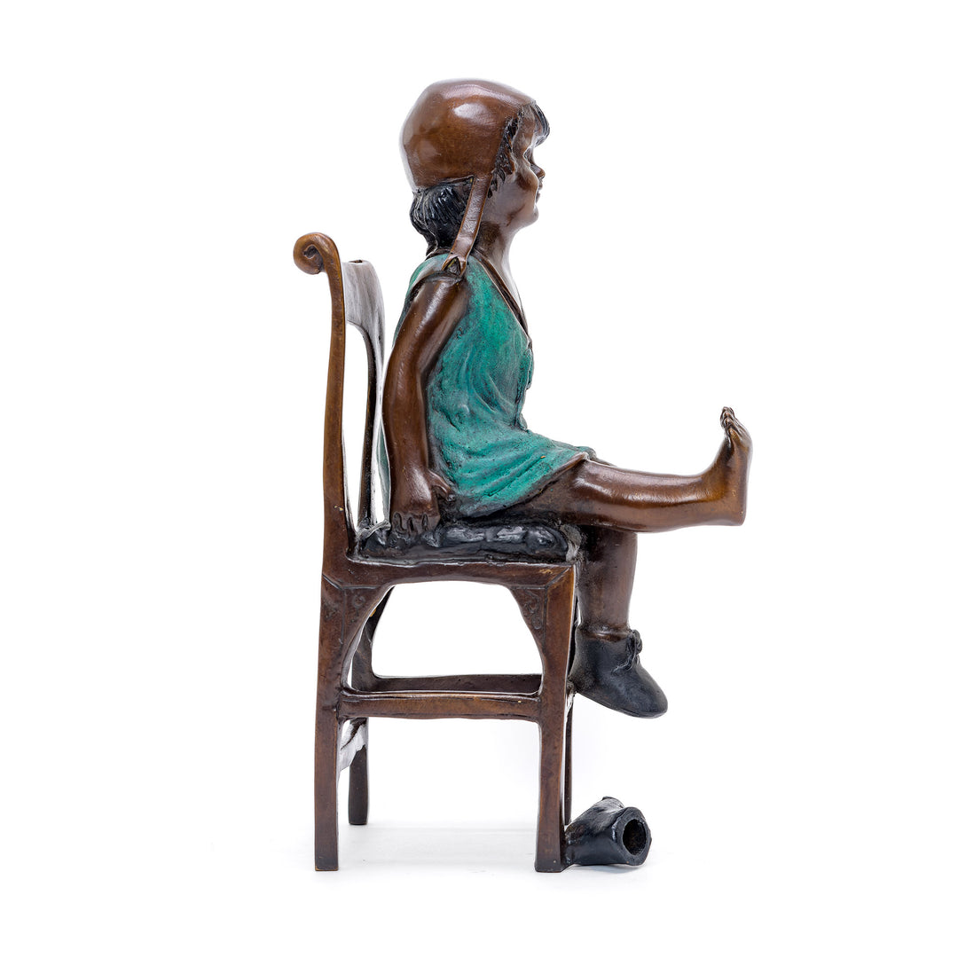 Tranquil Bronze Art Piece of Seated Child.