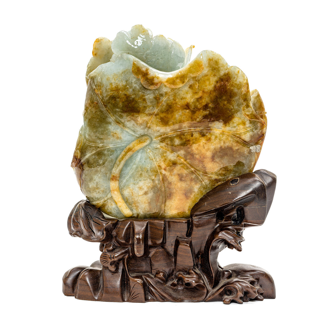 Unique jade carving of a lotus and crane, a serene addition to any collection