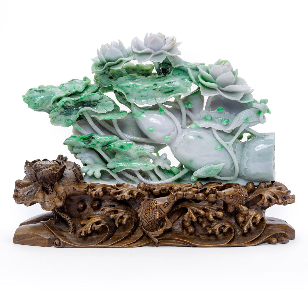 Exquisite hand carved jade sculpture with intertwined vines and lotus blossoms