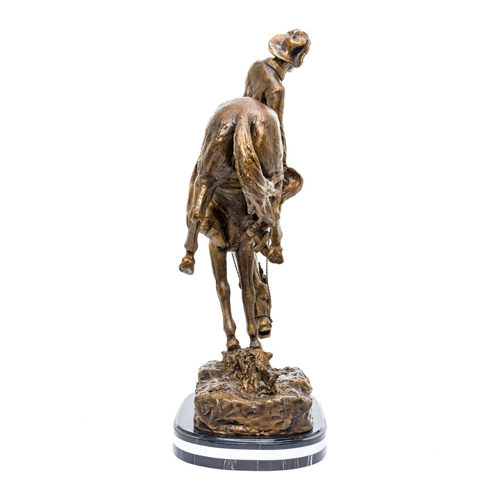 Dramatic Remington bronze statue depicting Wild West scene