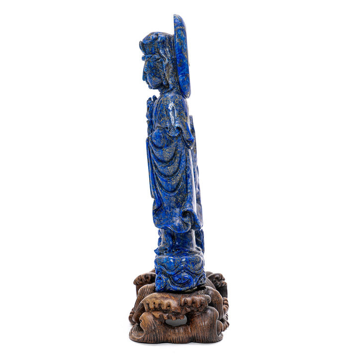 Serene bodhisattva carved in sapphire-hued lapis lazuli.