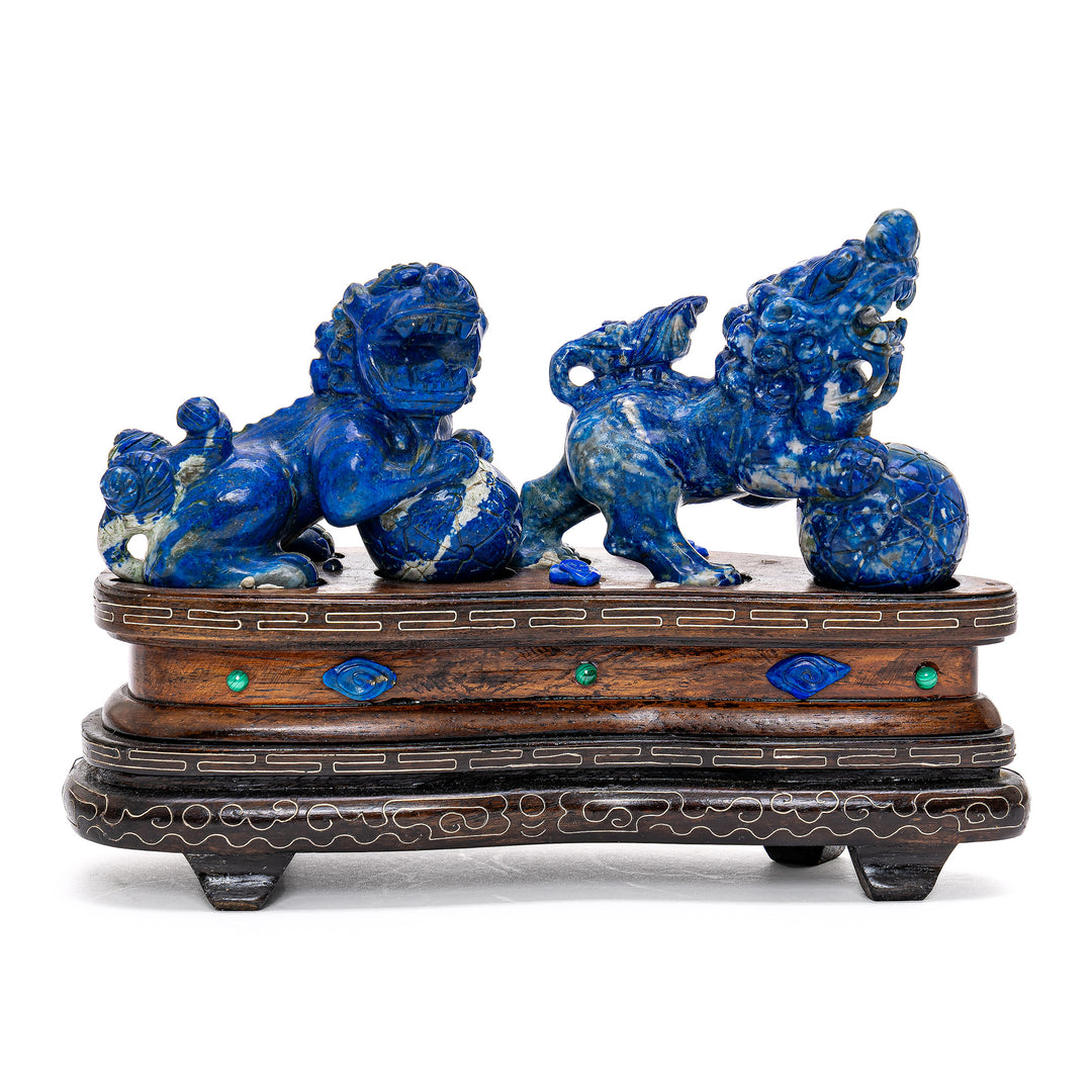 Estate-acquired pair of lapis Fu Lions on crafted base.