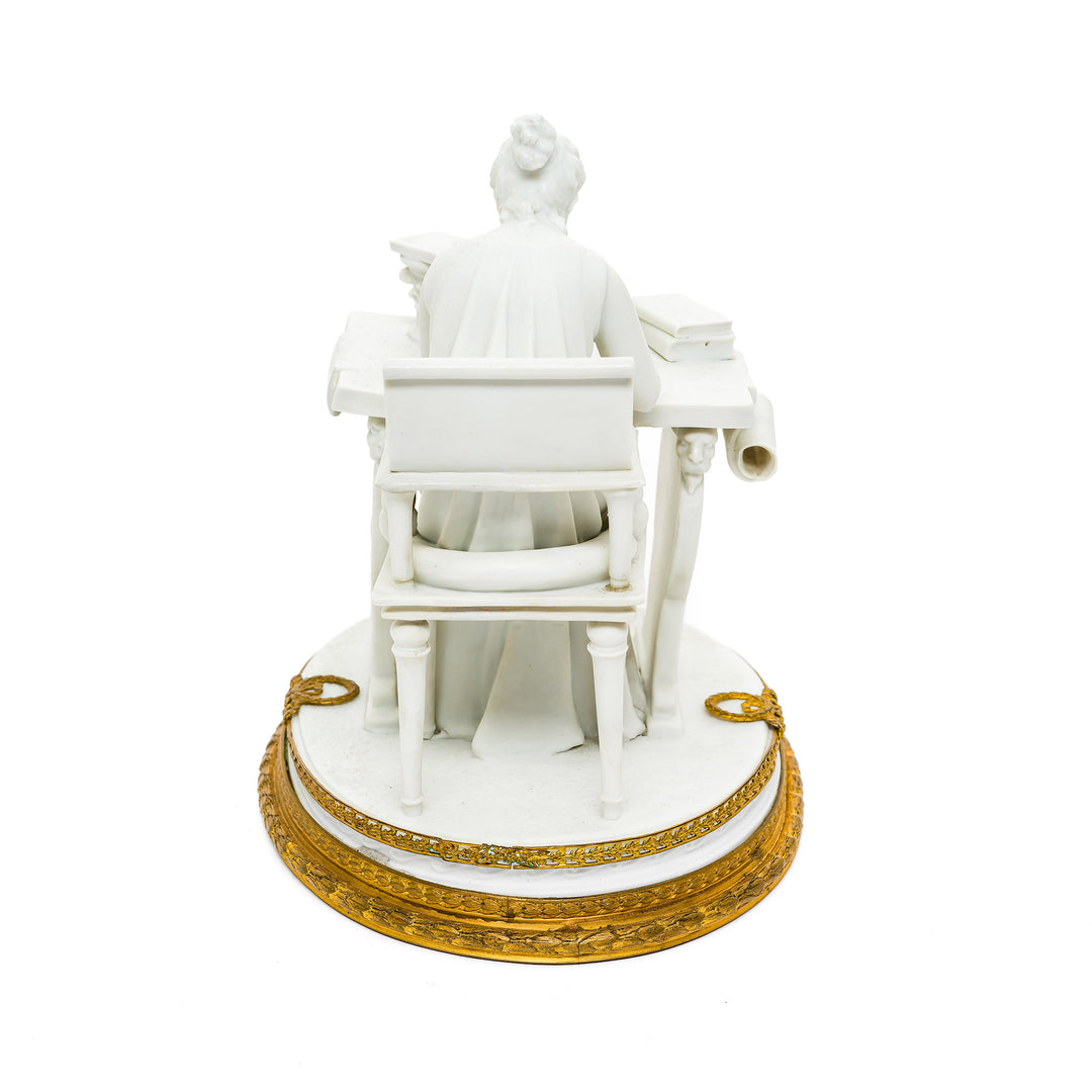 Artisan in porcelain at ornate work table by Vollstedt