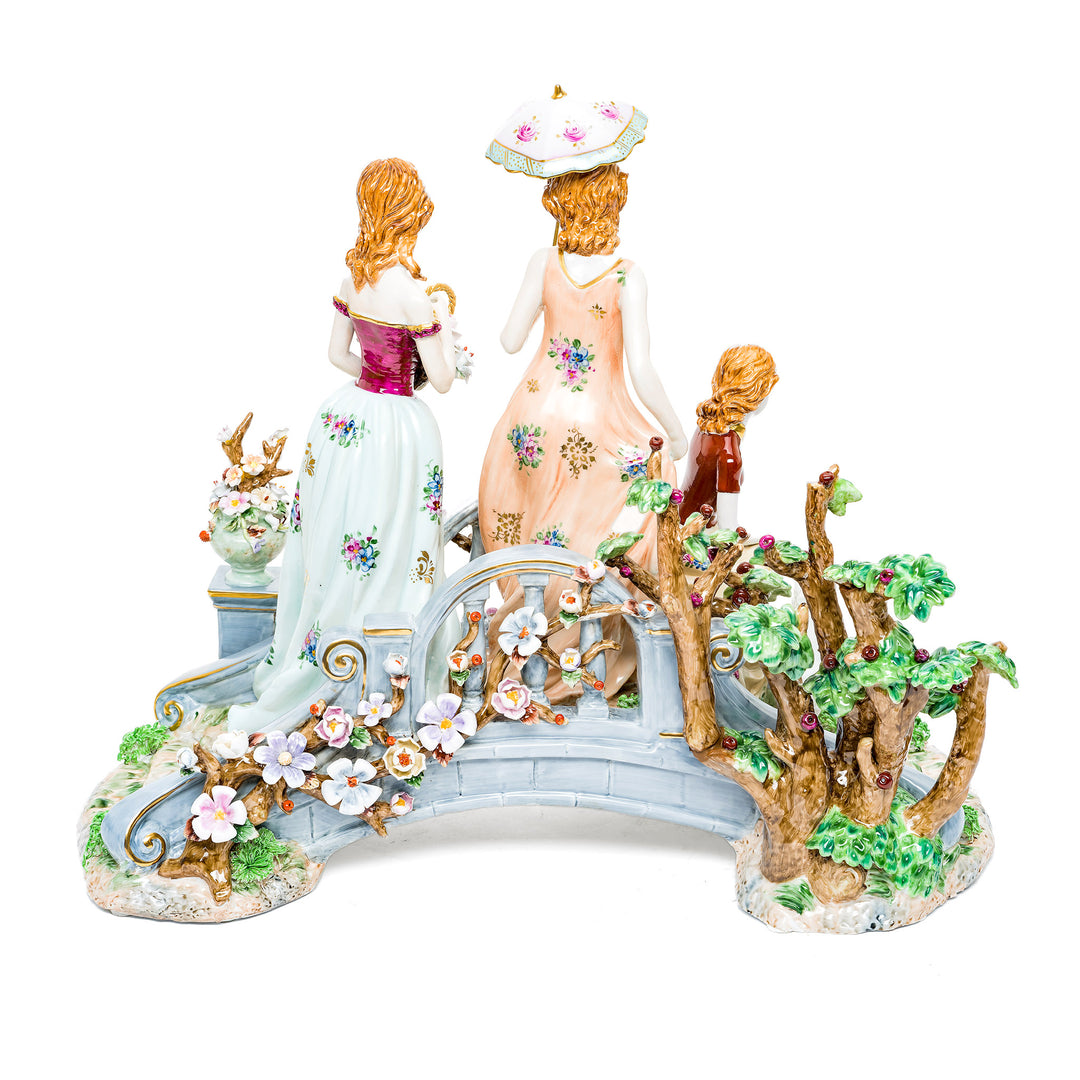 Beautifully crafted porcelain figurine showcasing intricate details and flowers.
