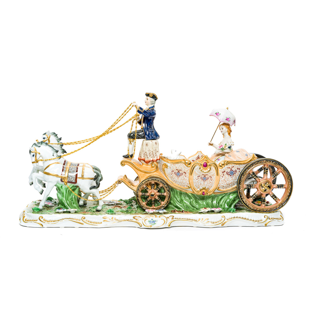 Cinderella Carriage porcelain sculpture with intricate floral designs and gilded accents.