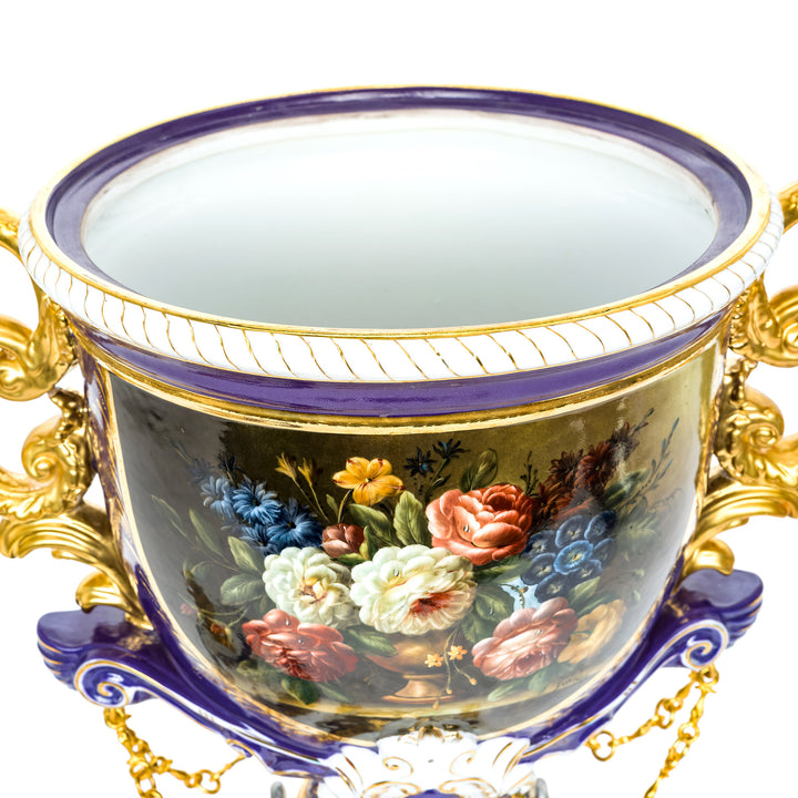 Collectible purple vase with gold trim and floral artwork