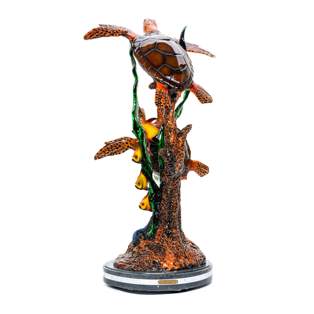Custom patina on bronze turtles and fish inspired by Ferrari and Lamborghini.