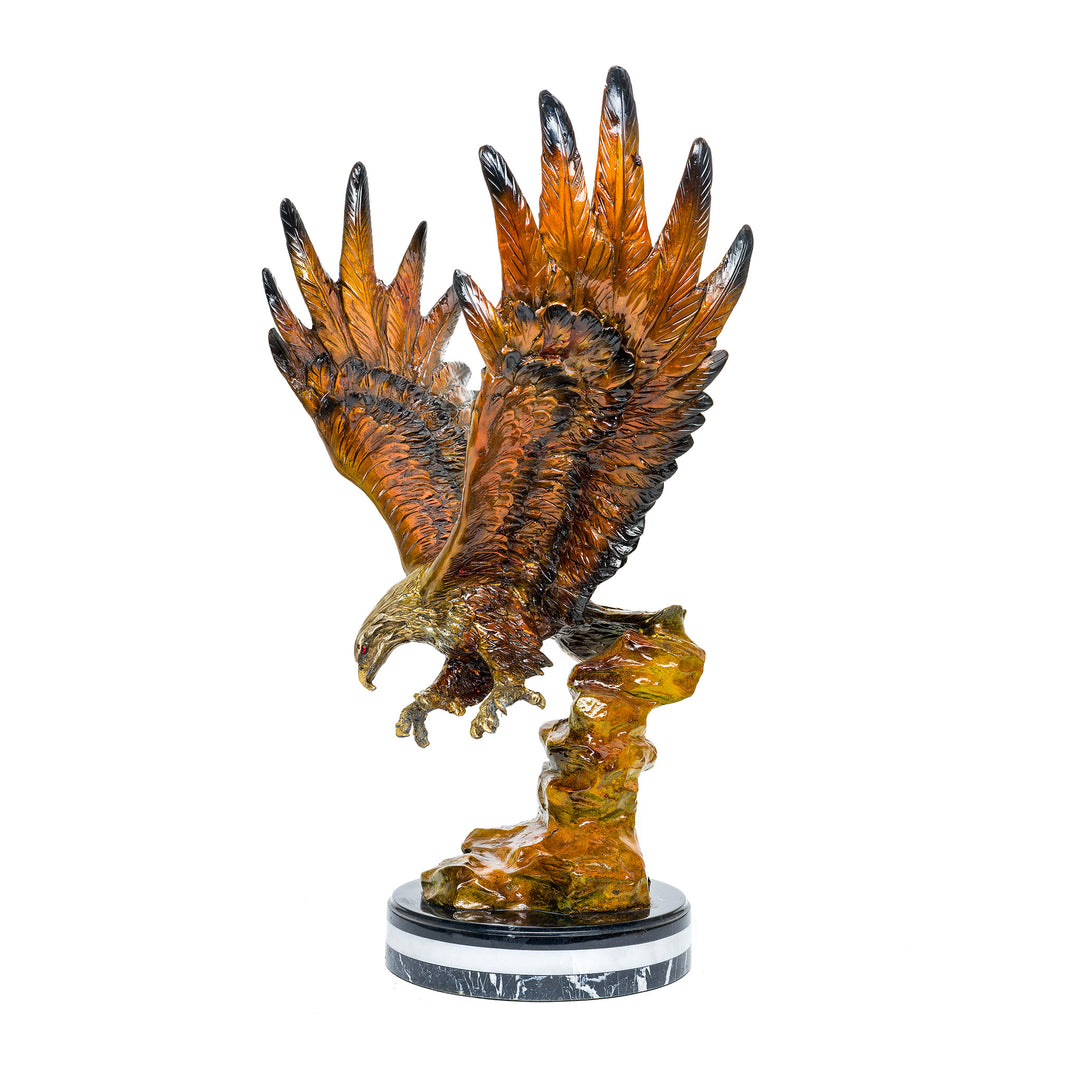 Detailed bronze hunter eagle sculpture with poised talons