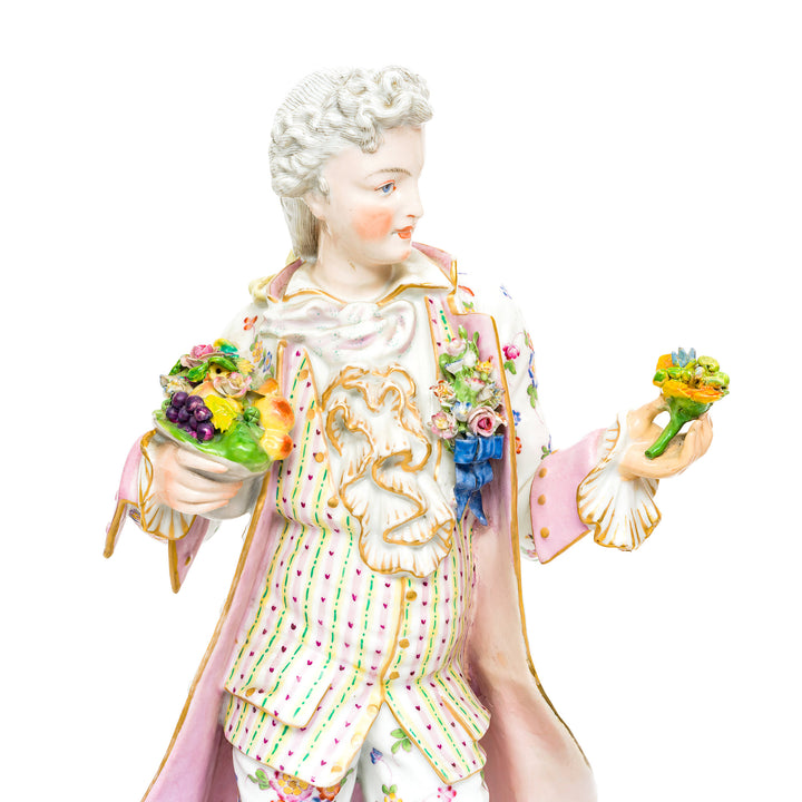 Detailed view of the gentleman offering a bouquet in the Rococo figurines.