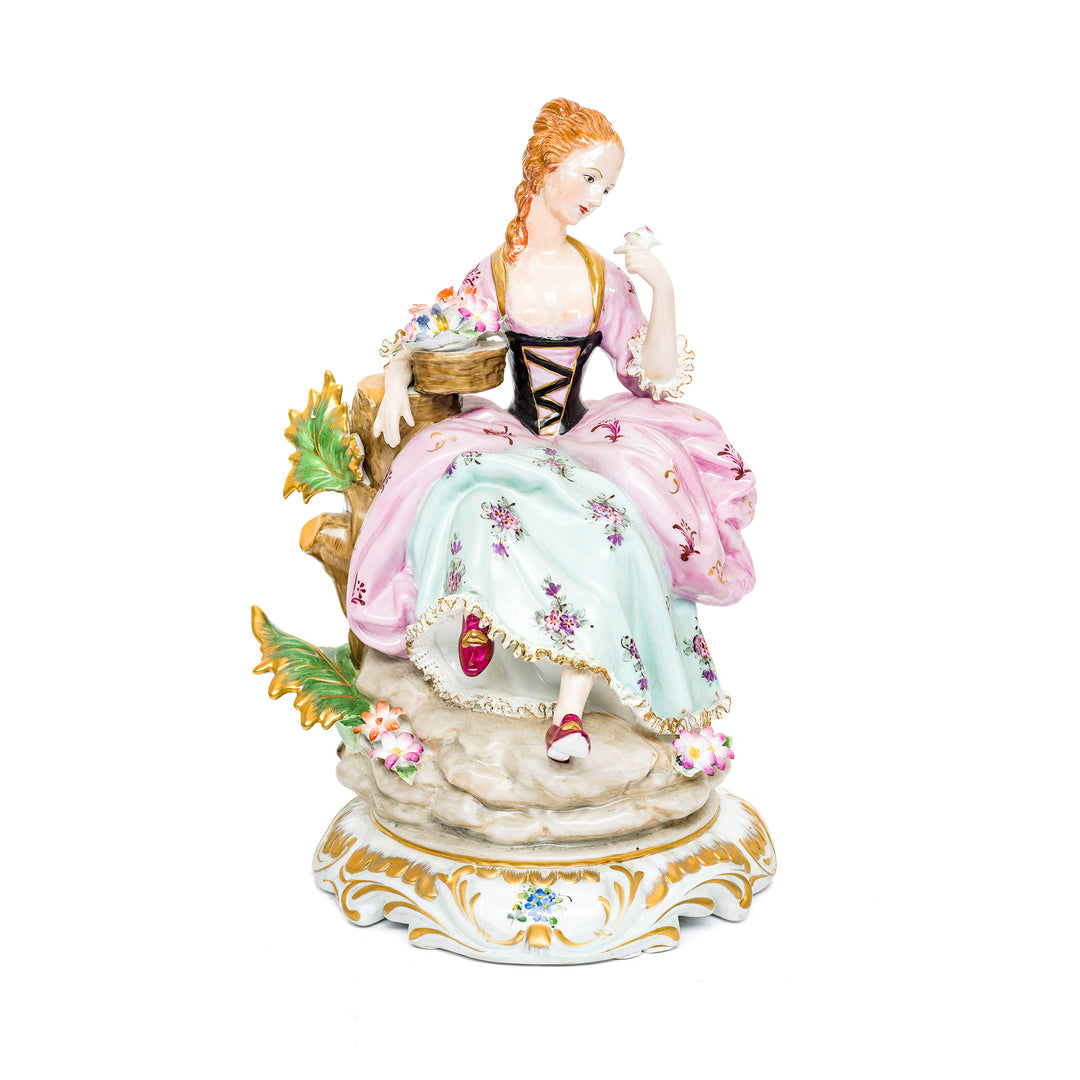 Dresden Porcelain Flower Lady with hand-painted floral gown.