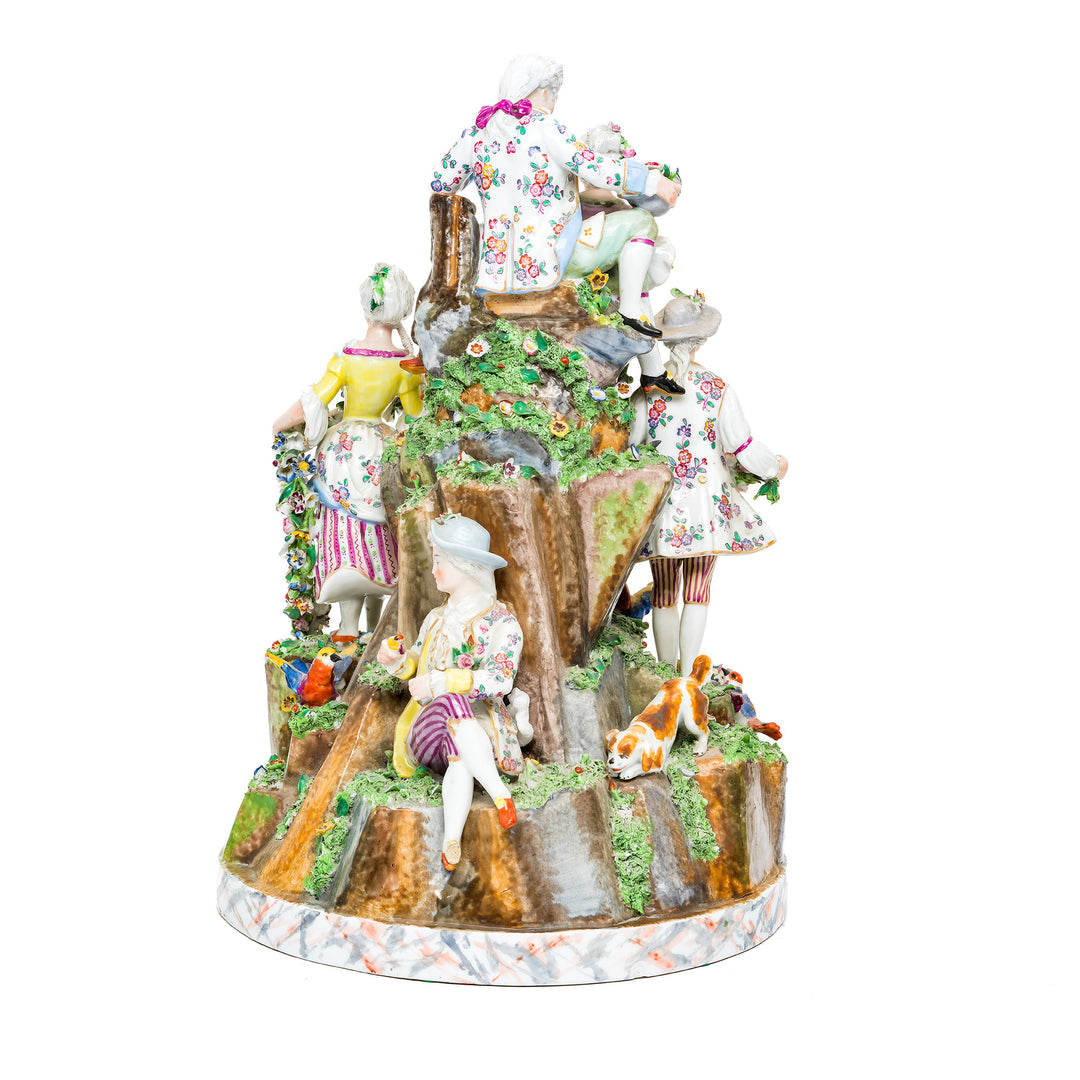 Dynamic Rococo figurine set capturing a lively aristocratic garden gathering.