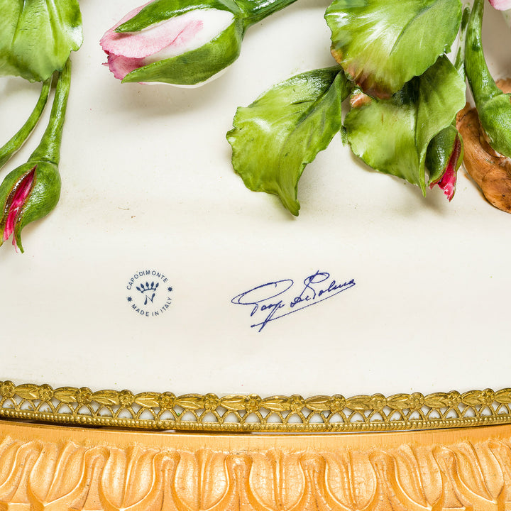 Elegant Capodimonte porcelain vases featuring intricate floral art.