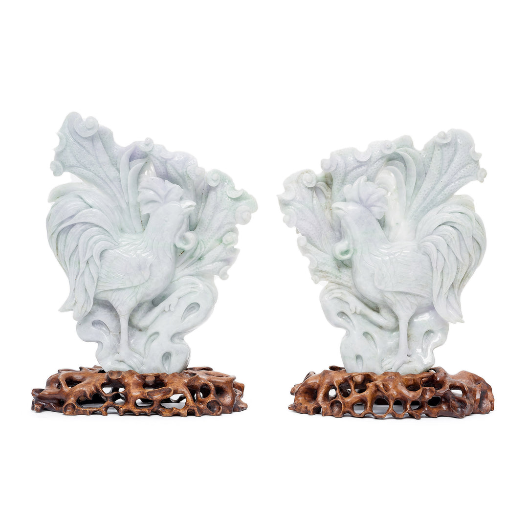 Elegant jade rooster carvings on natural wood bases