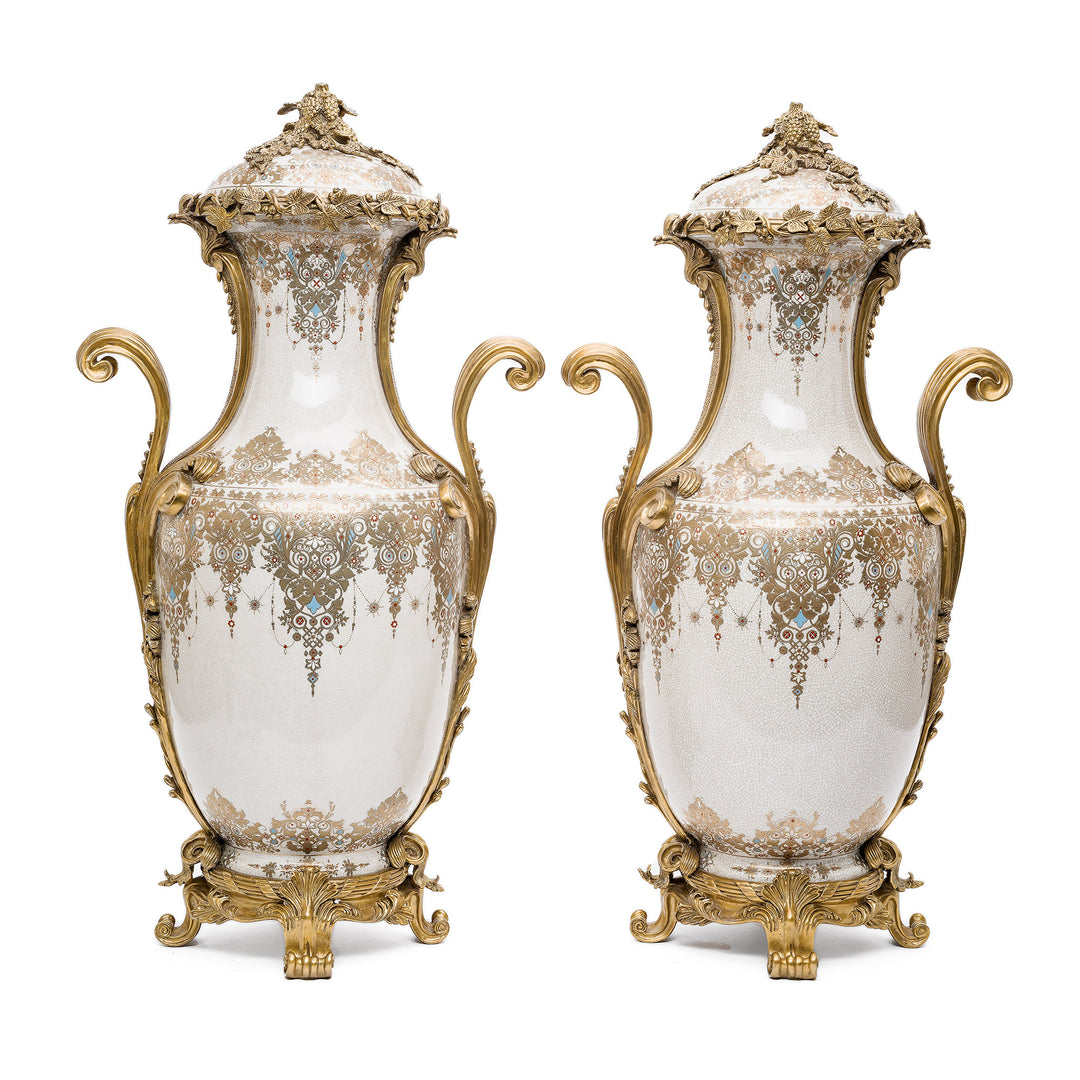Pair of crackle porcelain urns with ornate dore bronze mounts