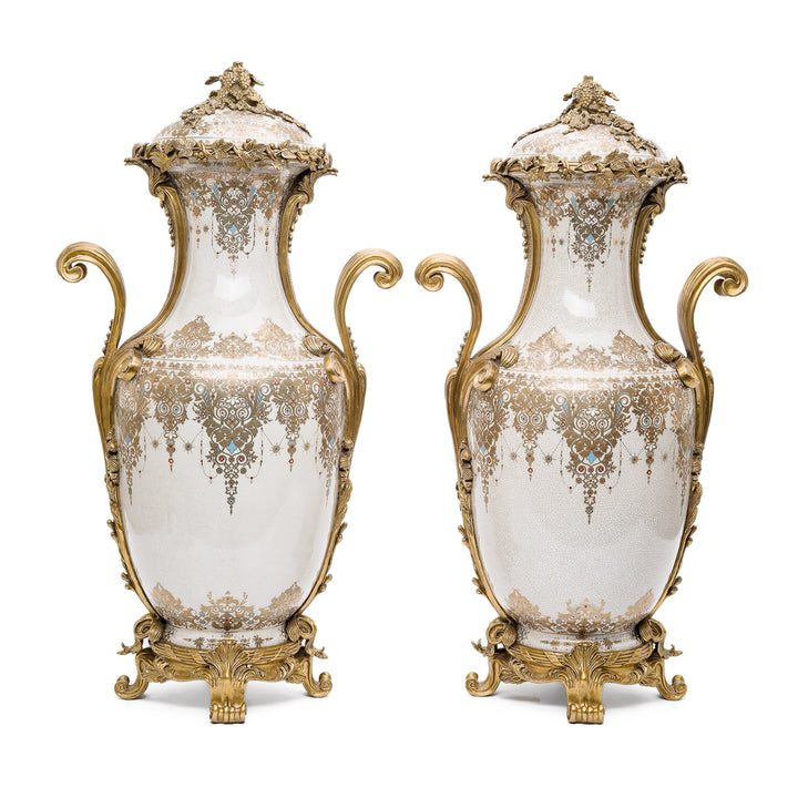 Pair of crackle porcelain urns with ornate dore bronze mounts
