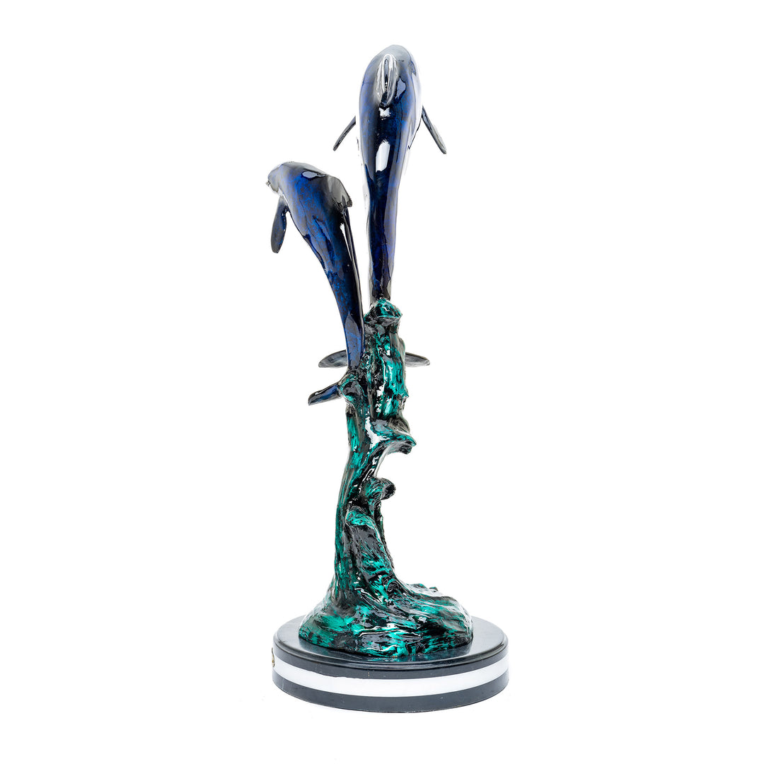 Elegant bronze dolphin sculpture with vibrant custom finish on marble base.