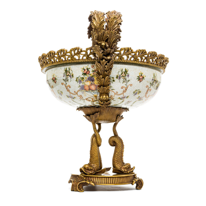 Elegant centerpiece with Dore bronze koi fish supports and scrolling handles.