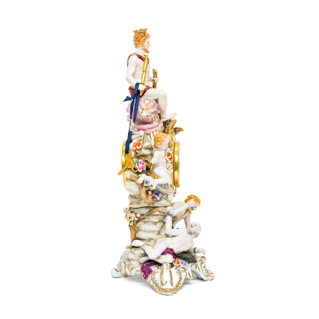 Elegant porcelain timepiece featuring classical figures in detailed poses.