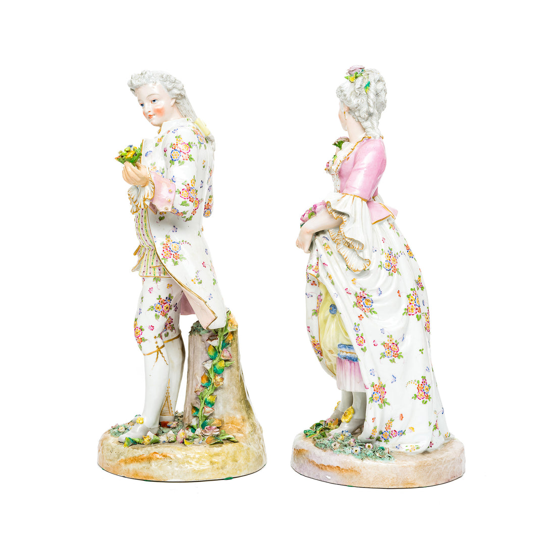 Exquisite Rococo-style figurines capturing 18th-century courtship.